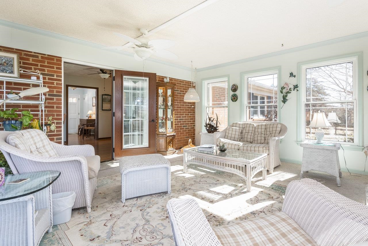 3885 Fulton School Road Dayton, VA 22821 - Photo 18 of 75 a living room with furniture and a large window