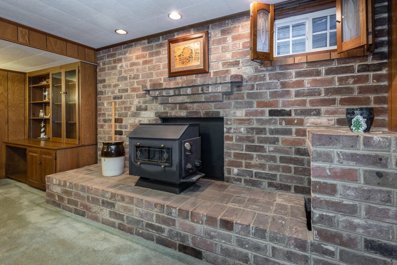 3885 Fulton School Road Dayton, VA 22821 - Photo 31 of 75 a living room with a fireplace