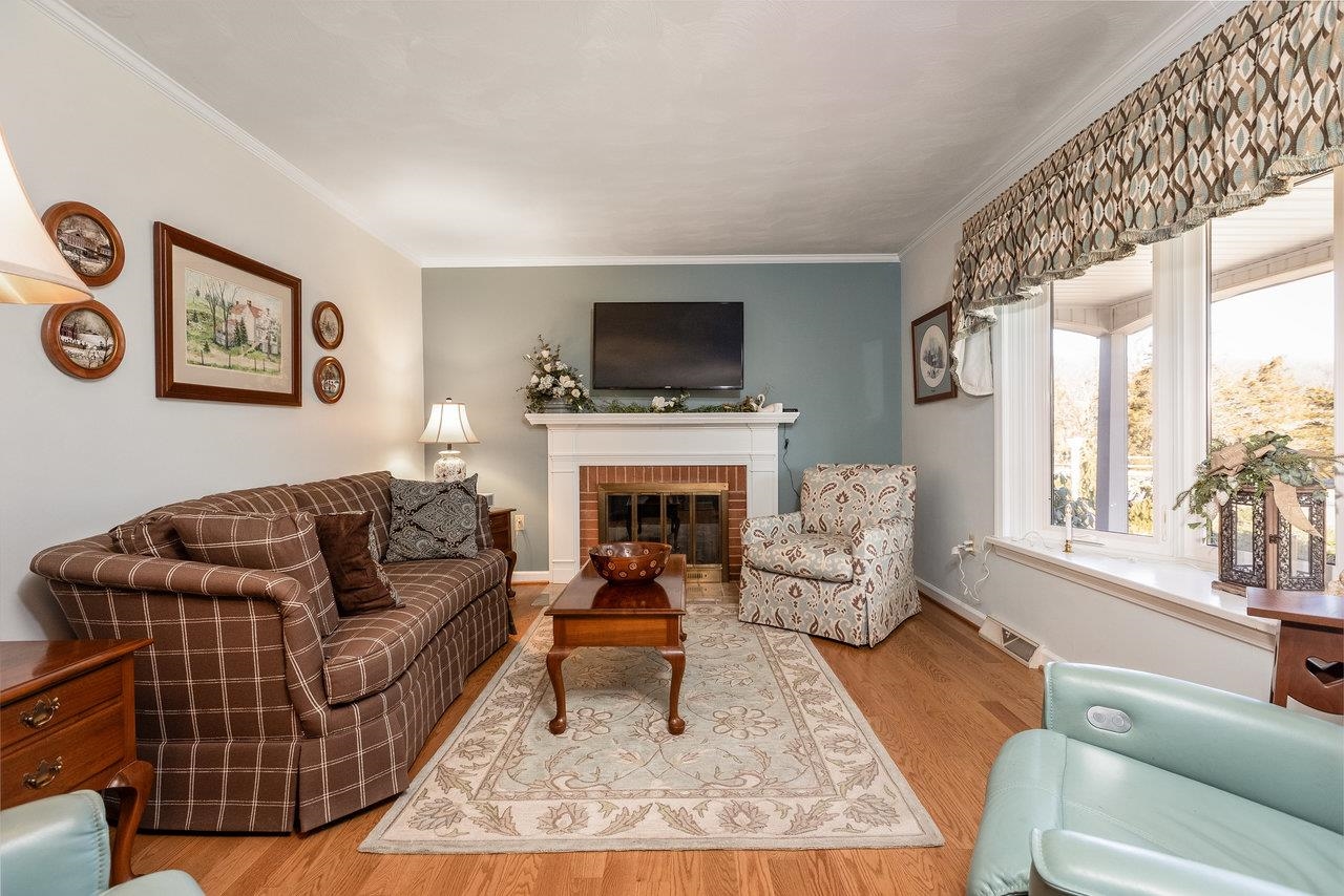 3885 Fulton School Road Dayton, VA 22821 - Photo 5 of 75 a living room with furniture fireplace and flat screen tv