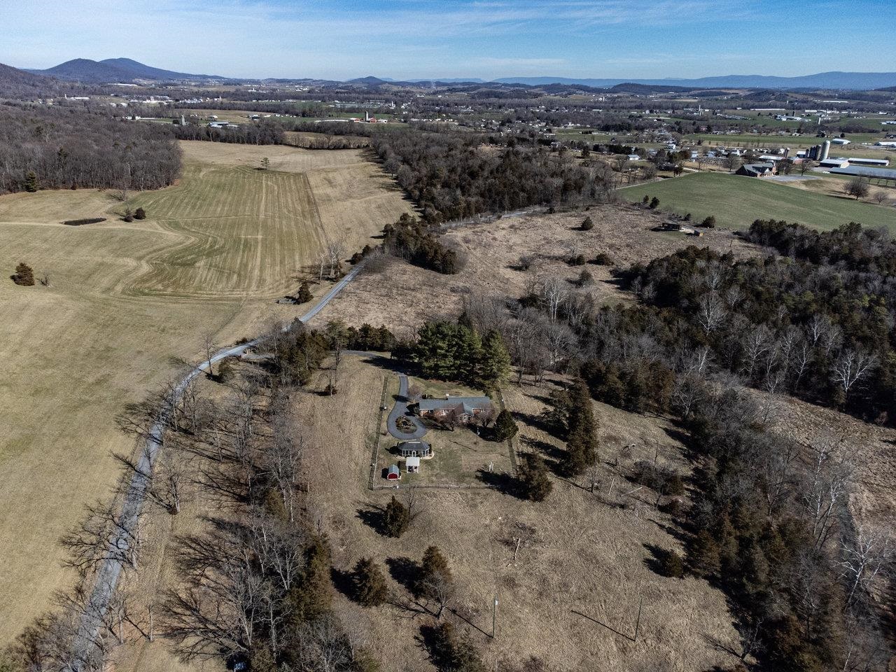 3885 Fulton School Road Dayton, VA 22821 - Photo 68 of 75 a view of a lake with mountains in the background
