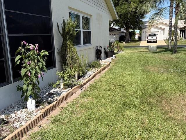 1629 Willow Run Sebring, FL 33872 - Photo 13 of 16 a view of a yard of the house