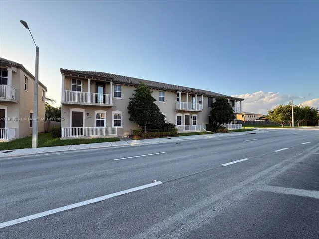 front view of a house with a street