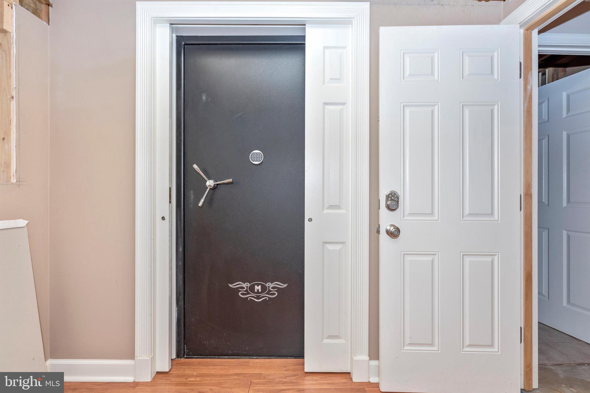 12901 Hessong Bridge Road Thurmont, MD 21788 - Photo 38 of 70 Concrete surrounded room with safe door as entry.
