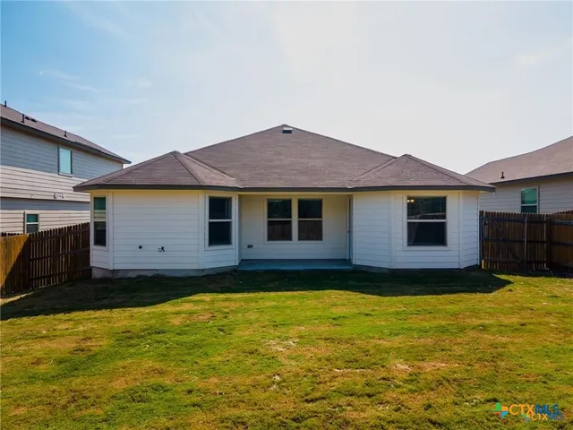 a house view with a garden space
