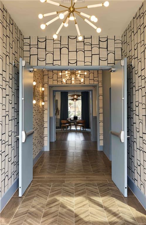 1809 Appaloosa Lane Northeast, Unit 1C Buford, GA 30519 - Photo 15 of 15 a lobby with furniture and a fireplace