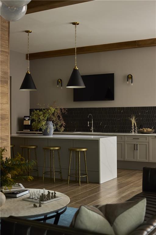 1809 Appaloosa Lane Northeast, Unit 1C Buford, GA 30519 - Photo 8 of 15 a kitchen with stainless steel appliances granite countertop a sink a stove and refrigerator