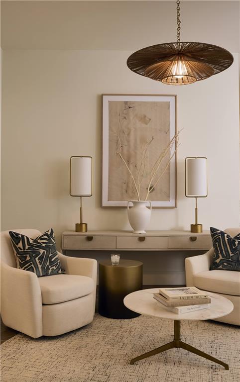 1809 Appaloosa Lane Northeast, Unit 1C Buford, GA 30519 - Photo 10 of 15 a living room with furniture and a lamp