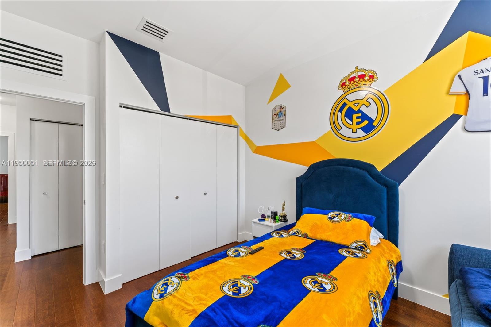 7226 Northwest 103rd Path Doral, FL 33178 - Photo 26 of 38 a room with bed and wooden floor