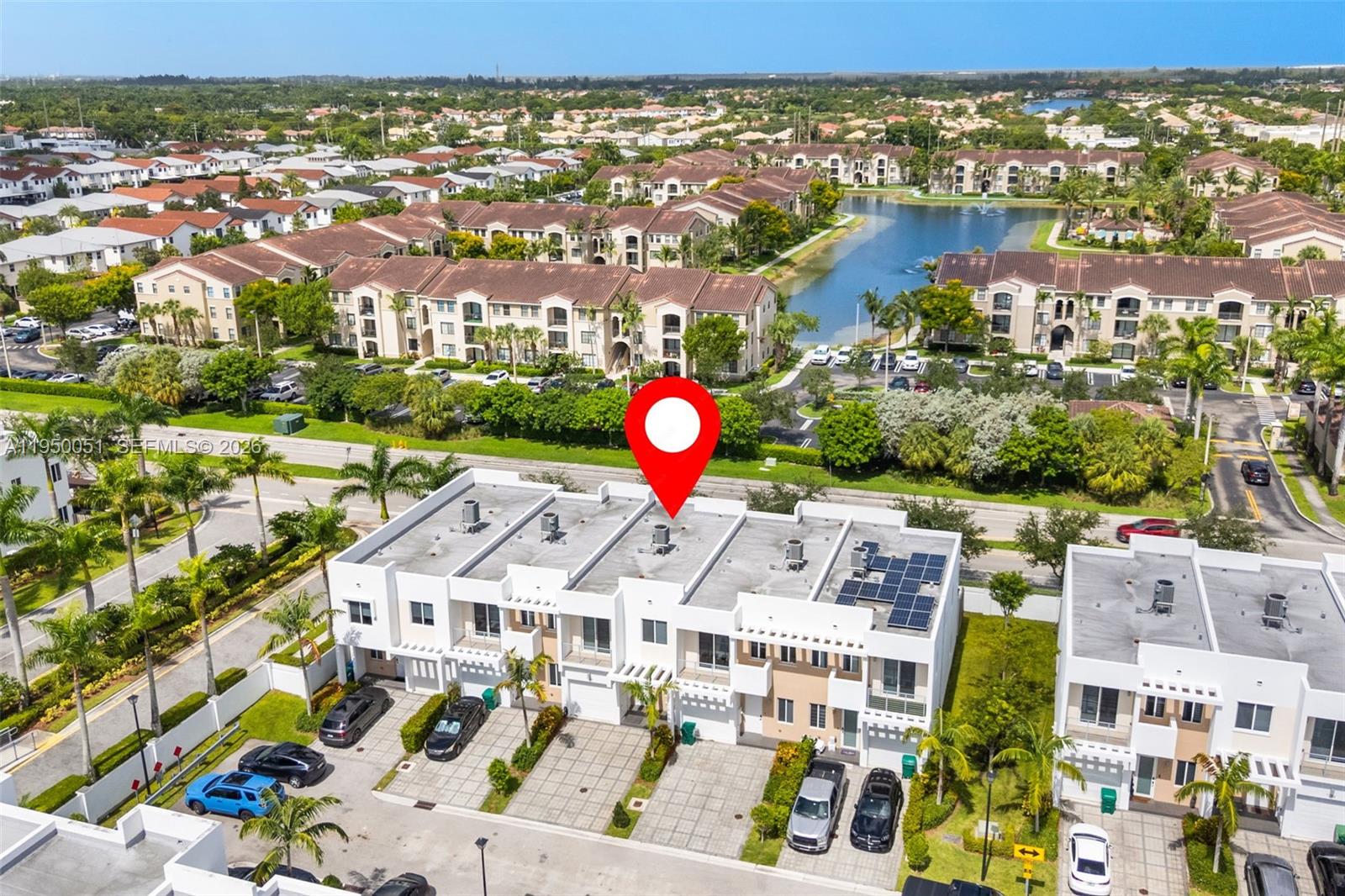 7226 Northwest 103rd Path Doral, FL 33178 - Photo 31 of 38 an aerial view of residential houses with outdoor space and swimming pool