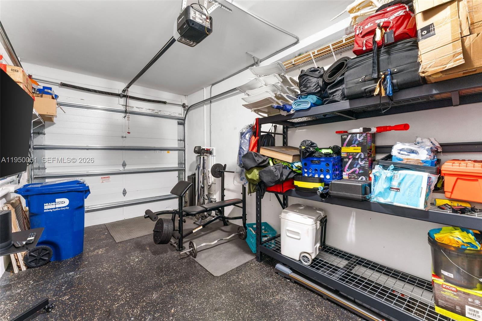 7226 Northwest 103rd Path Doral, FL 33178 - Photo 7 of 38 a view of a storage room with shelves