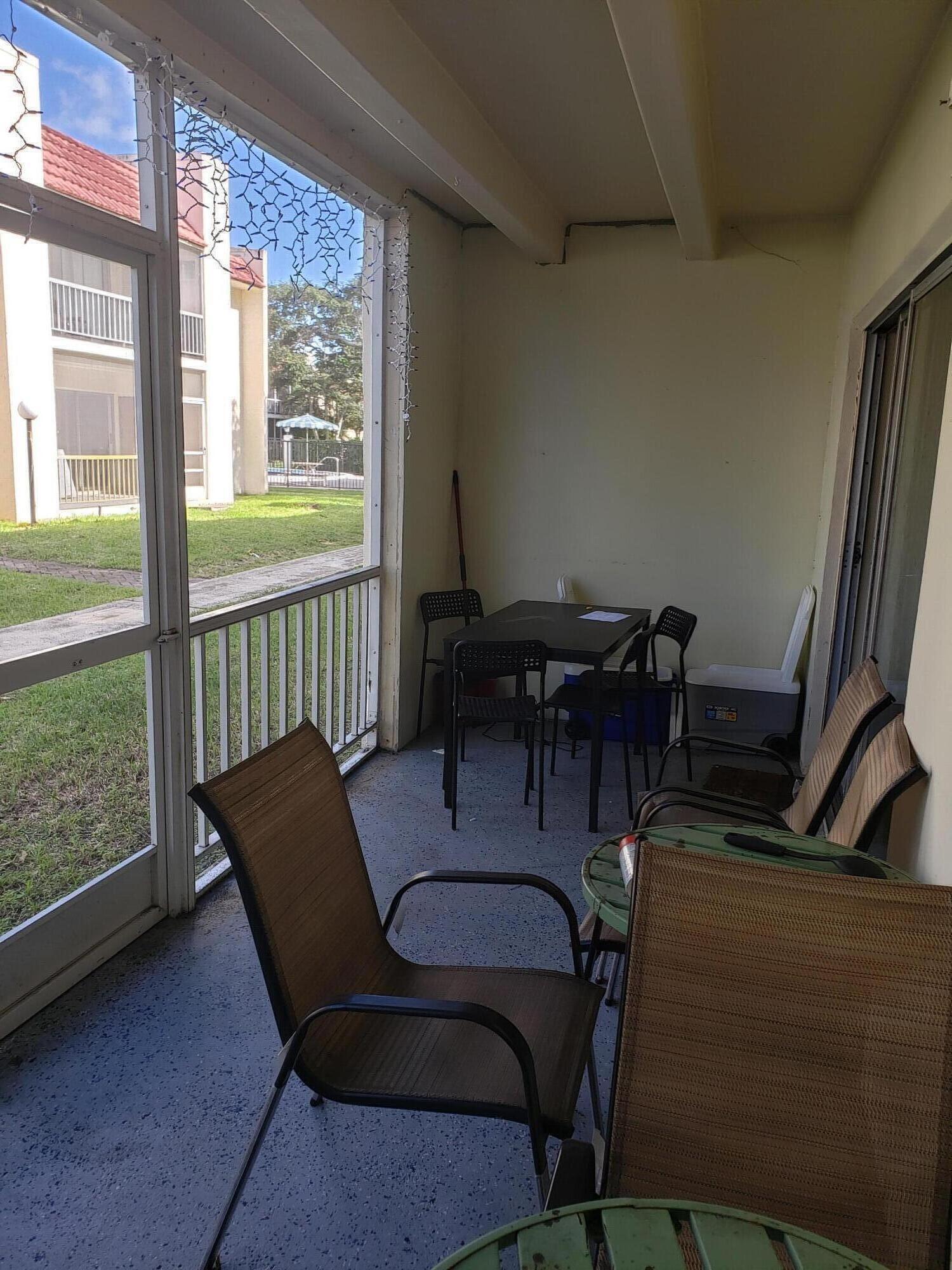 618 Northwest 13th Street, Unit 18 Boca Raton, FL 33486 - Photo 11 of 13 Enclosed Lanai