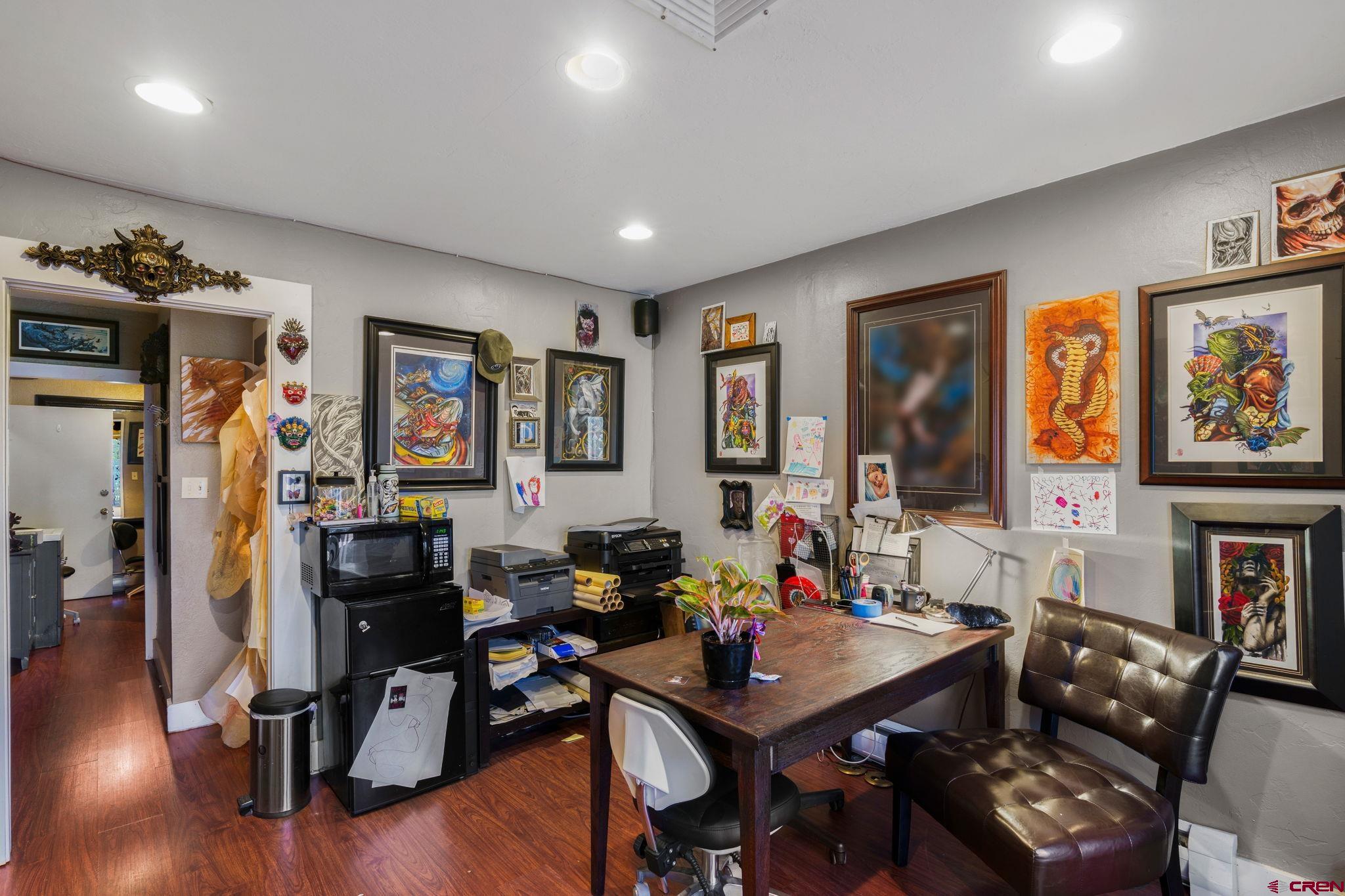 171 East 7th Street Durango, CO 81301 - Photo 20 of 36 a view of a livingroom with furniture and a workspace