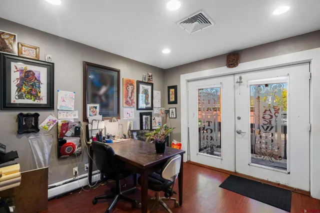 a view of a livingroom with furniture and window