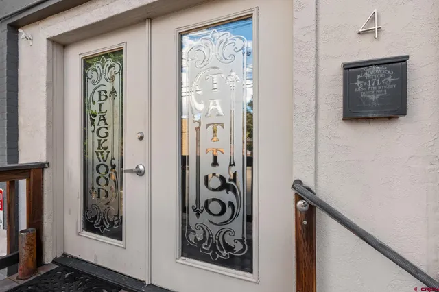 a view of a hallway with entryway
