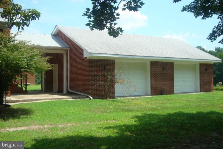 9001 Marye Road Partlow, VA 22534 - Photo 18 of 25 a front view of house with yard and green space