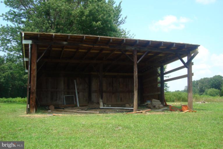 9001 Marye Road Partlow, VA 22534 - Photo 20 of 25 front view of a house with a yard