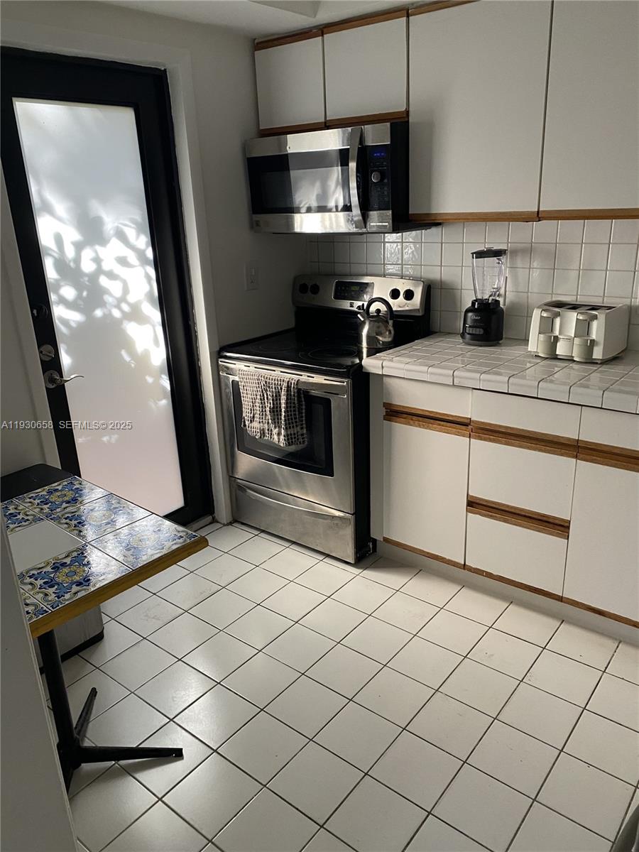 8950 Collins Avenue, Unit 7 Surfside, FL 33154 - Photo 2 of 24