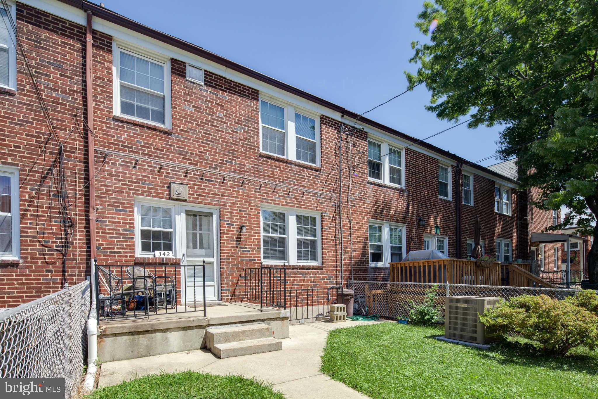 342 Greenlow Road Baltimore, MD 21228 - Photo 28 of 28 a brick building that has a lots of windows in it