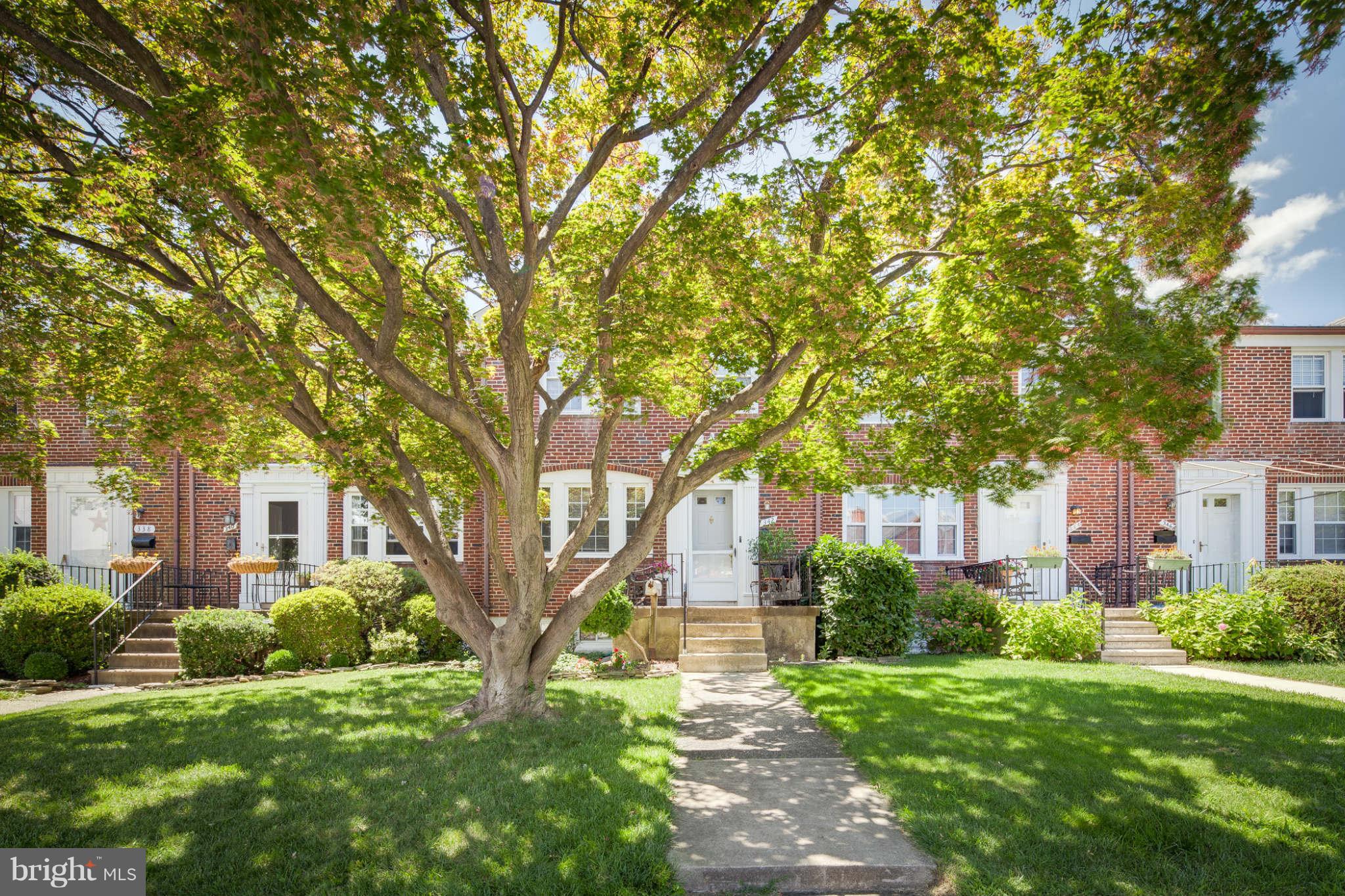 342 Greenlow Road Baltimore, MD 21228 - Photo 5 of 28 a view of a yard in front of a house
