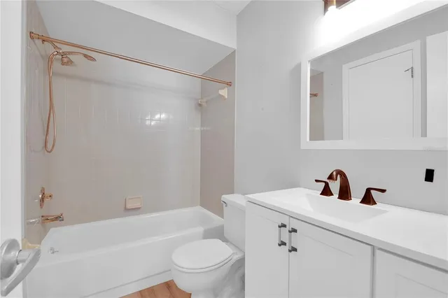 a view of a porch with wooden floor and outdoor space