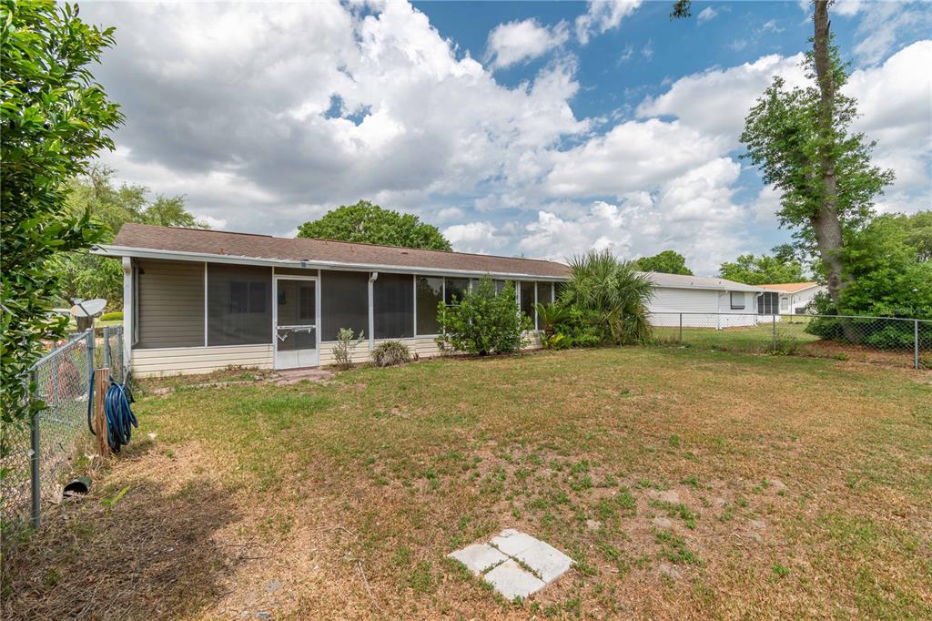 6366 Southwest 115th Street Road Ocala, FL 34476 - Photo 33 of 45 a house view with a garden space