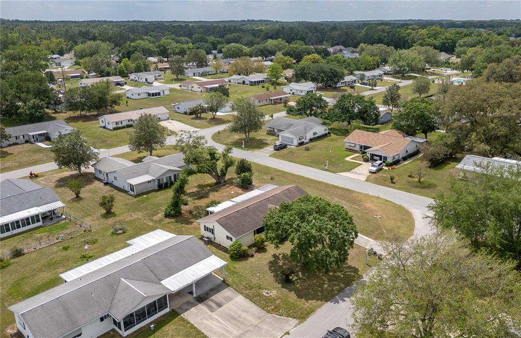 6366 Southwest 115th Street Road Ocala, FL 34476 - Photo 38 of 45 an aerial view of residential houses with outdoor space