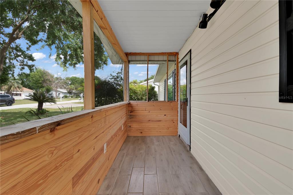 6366 Southwest 115th Street Road Ocala, FL 34476 - Photo 4 of 45 a view of railway station with wooden floor