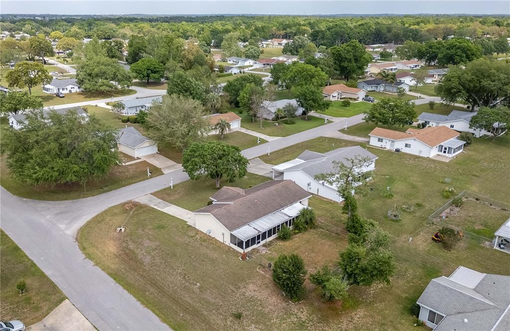 6366 Southwest 115th Street Road Ocala, FL 34476 - Photo 41 of 45 an aerial view of residential houses with outdoor space