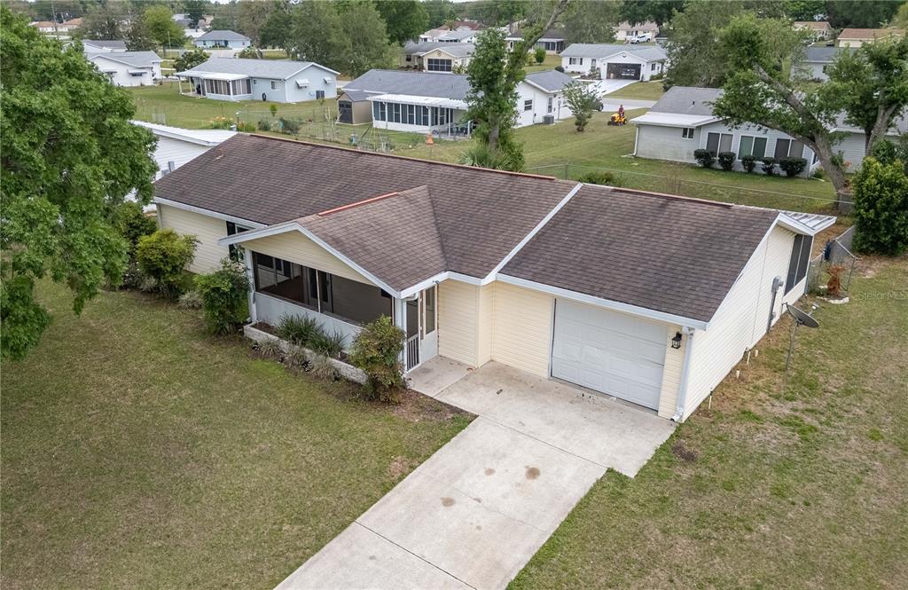 6366 Southwest 115th Street Road Ocala, FL 34476 - Photo 45 of 45 an aerial view of a house with a yard