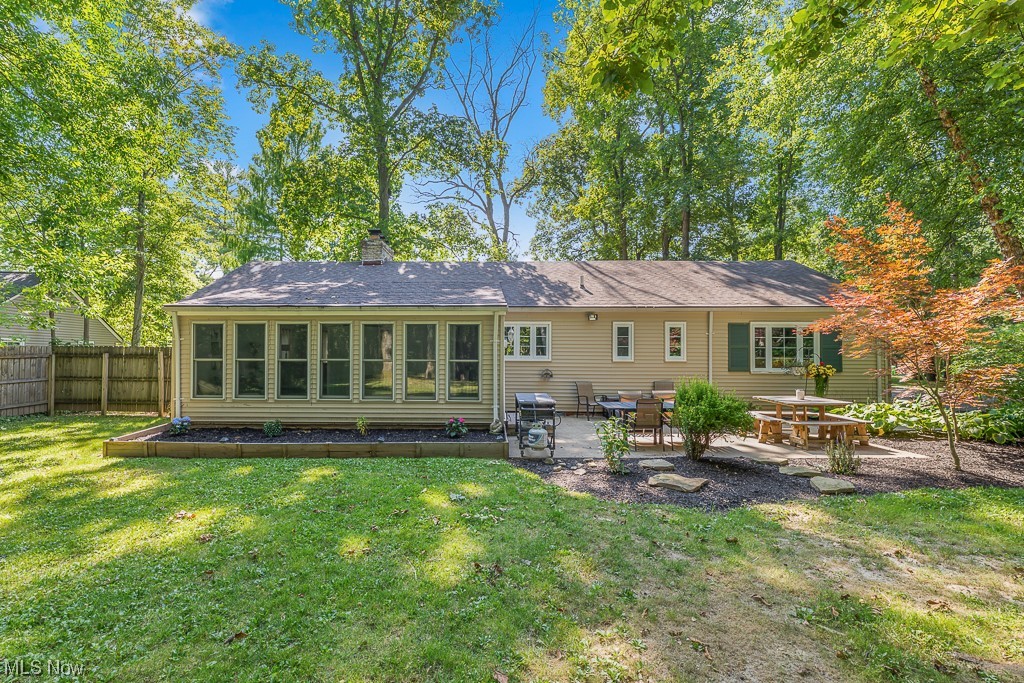 32261 Cedar Road Cleveland, OH 44124 - Photo 2 of 35 Back of house featuring a lawn and a patio area