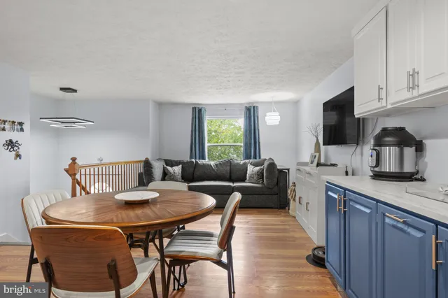 a view of living room filled with furniture and window
