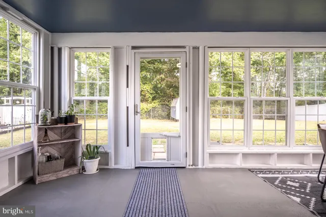 a backyard of a house with a garden and entertaining space