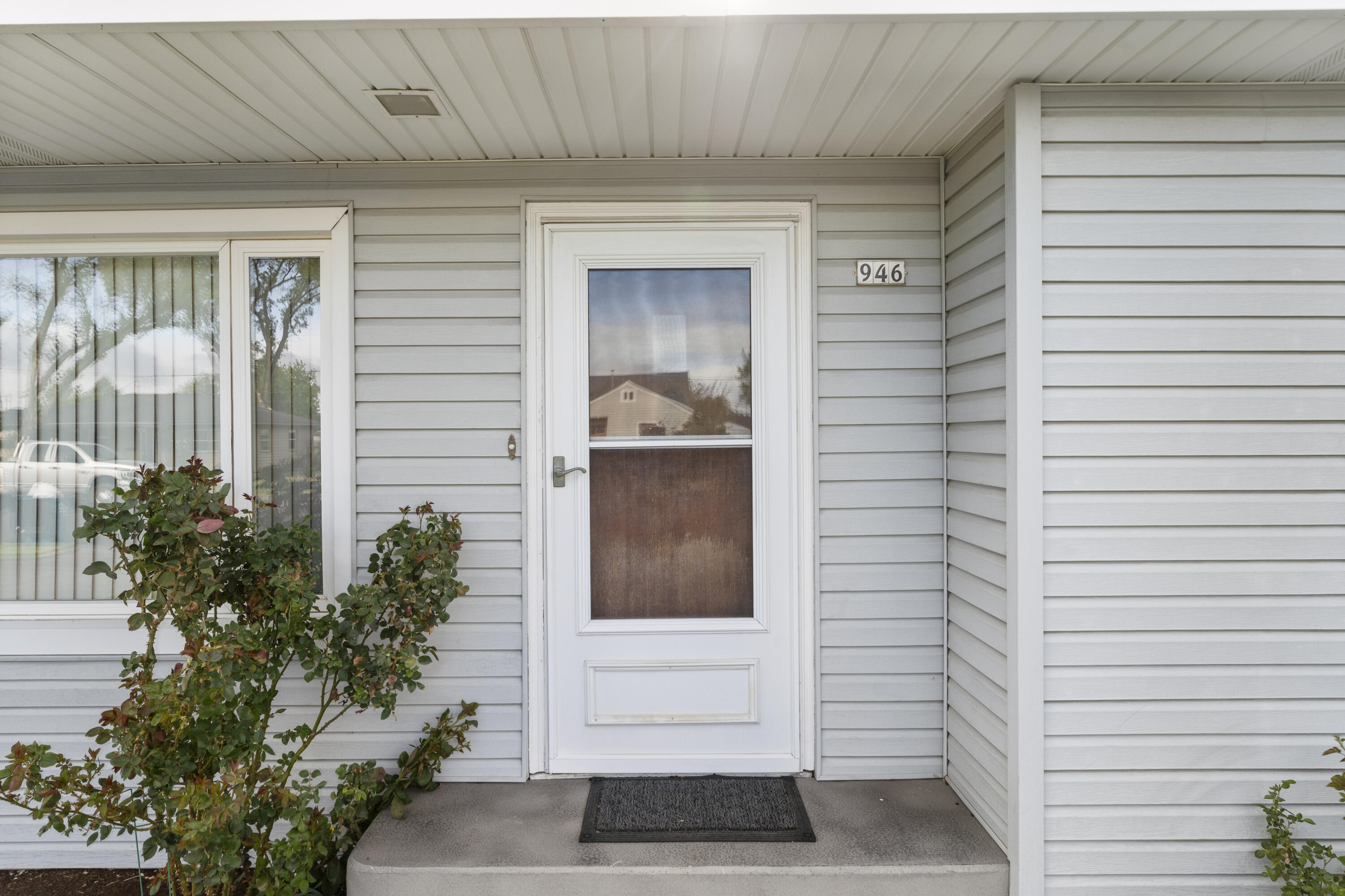 946 Southwest 13th Street Redmond, OR 97756 - Photo 4 of 49 a view of a door and a window