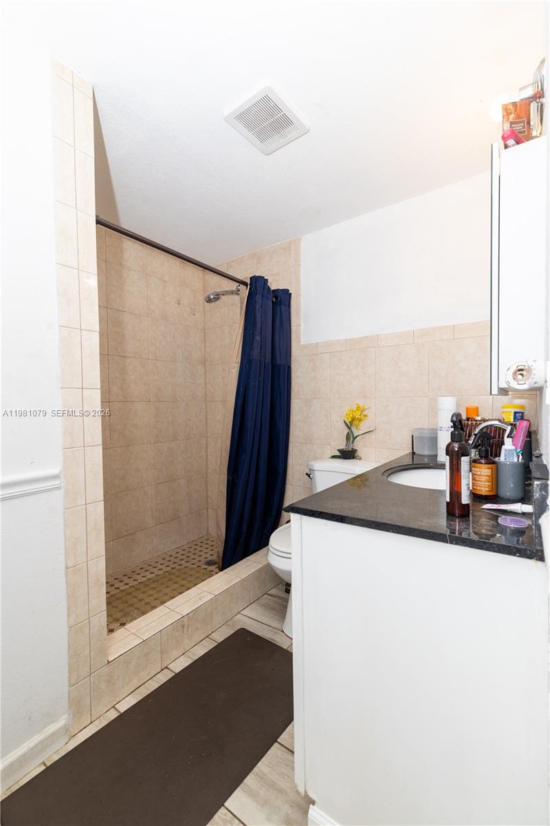 19600 Gulfstream Road Cutler Bay, FL 33157 - Photo 16 of 36 a view of a living room with a couch