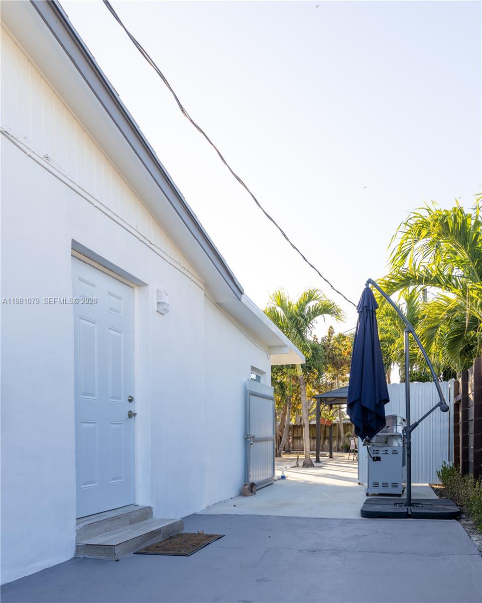 19600 Gulfstream Road Cutler Bay, FL 33157 - Photo 21 of 36 a view of a house with potted plants
