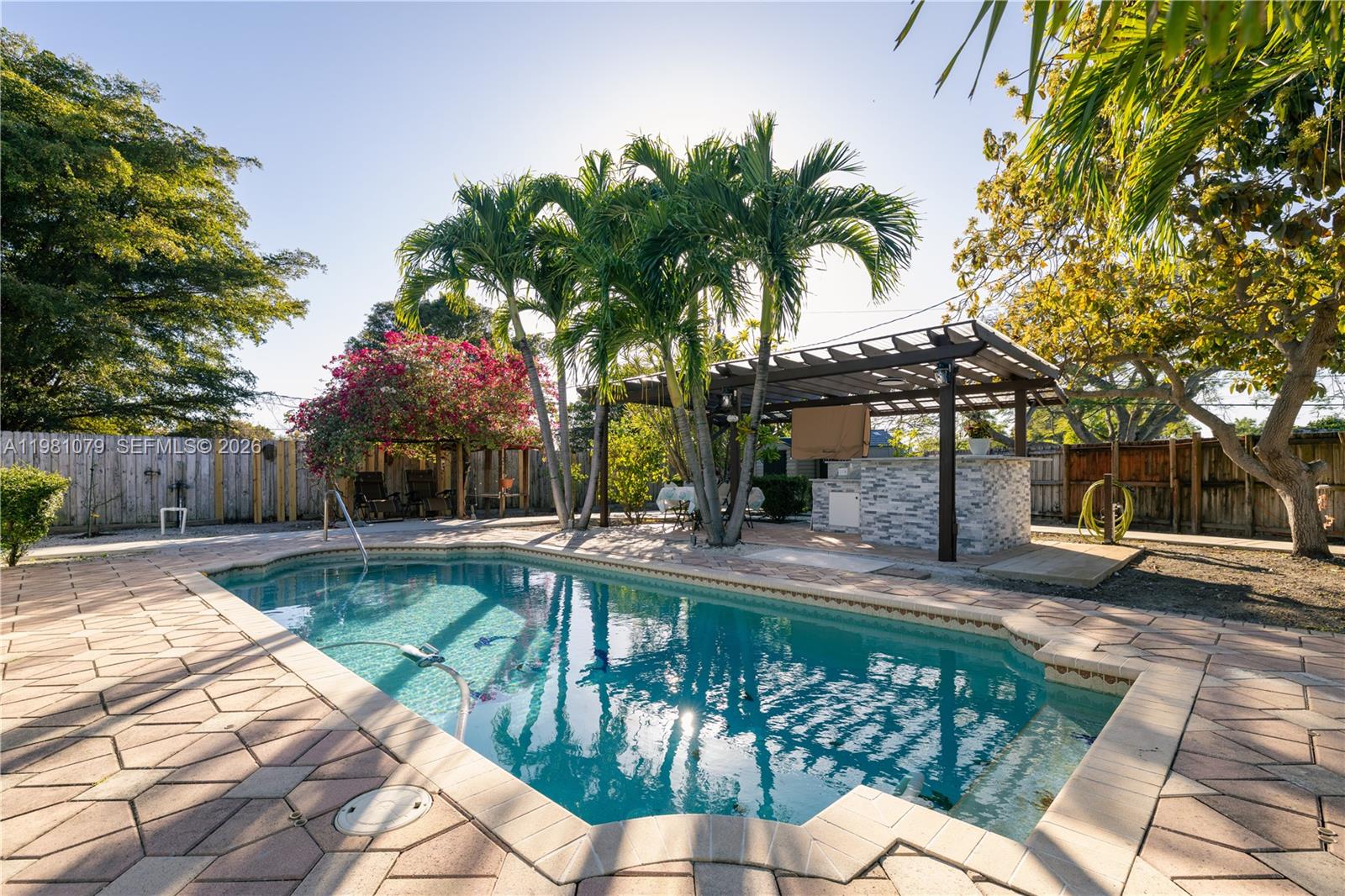 19600 Gulfstream Road Cutler Bay, FL 33157 - Photo 25 of 36 a view of a house with swimming pool and sitting area