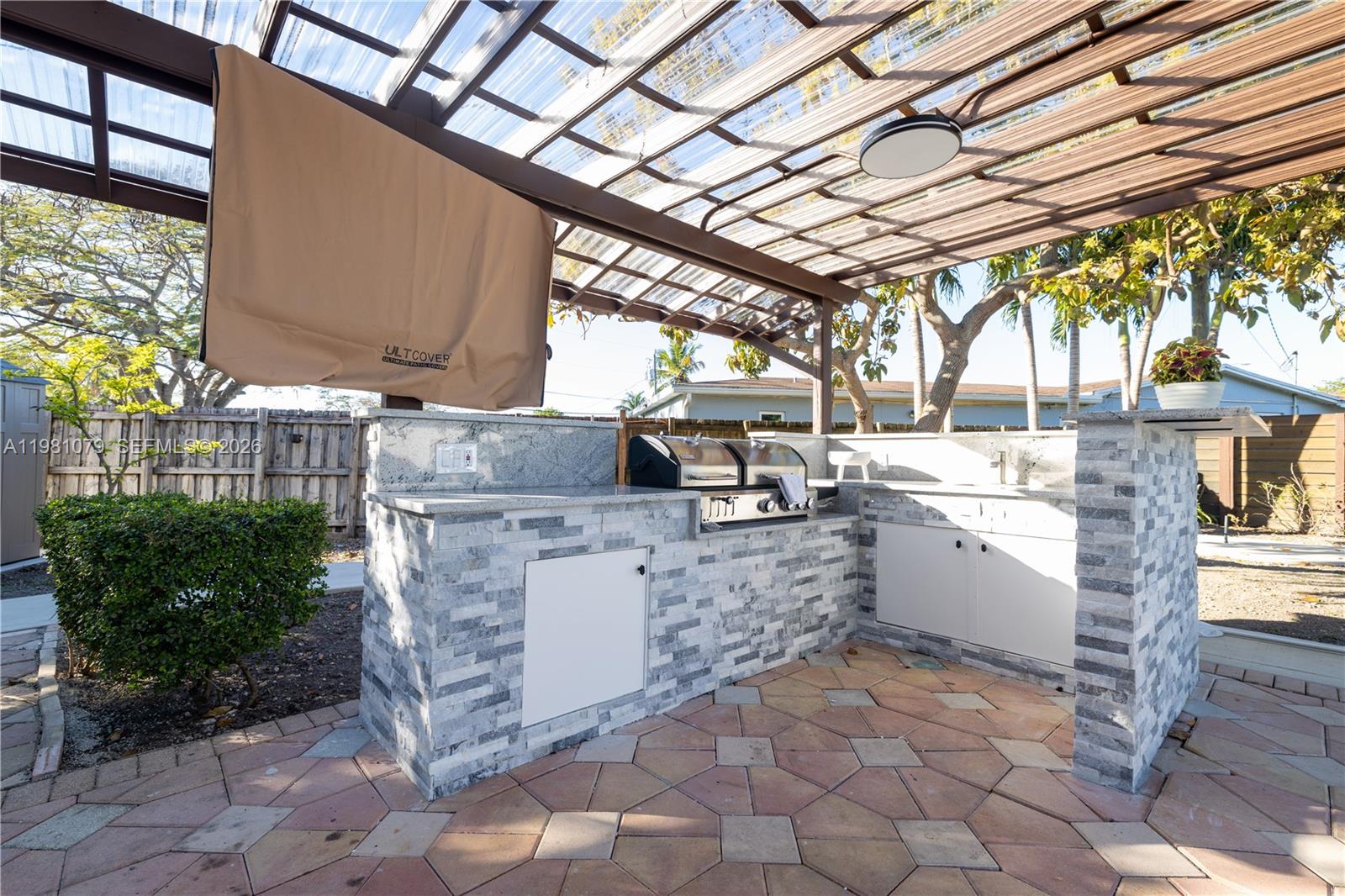 19600 Gulfstream Road Cutler Bay, FL 33157 - Photo 27 of 36 a room with storage and utility