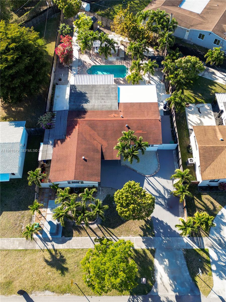 19600 Gulfstream Road Cutler Bay, FL 33157 - Photo 34 of 36 front view of a house with a yard