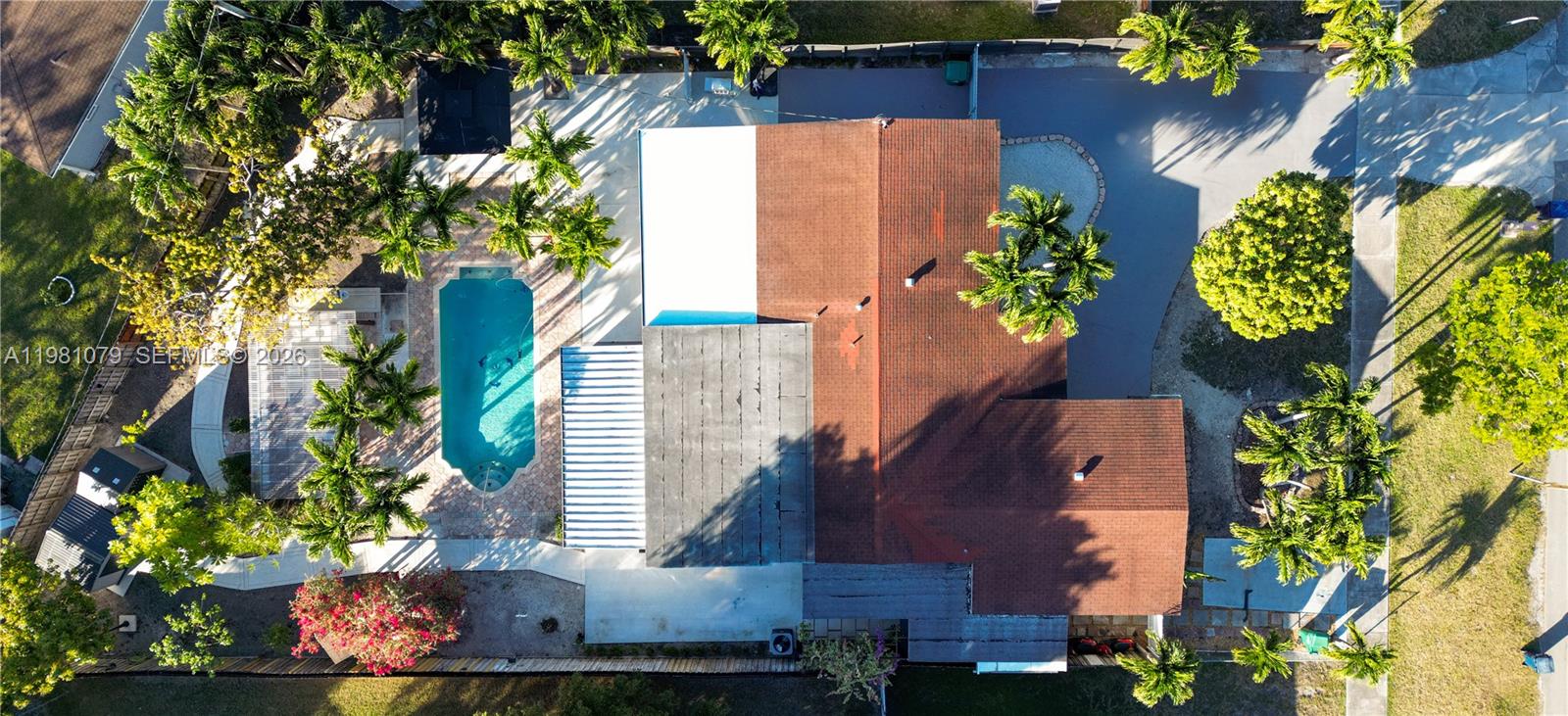19600 Gulfstream Road Cutler Bay, FL 33157 - Photo 36 of 36 an aerial view of a house with a yard and garden