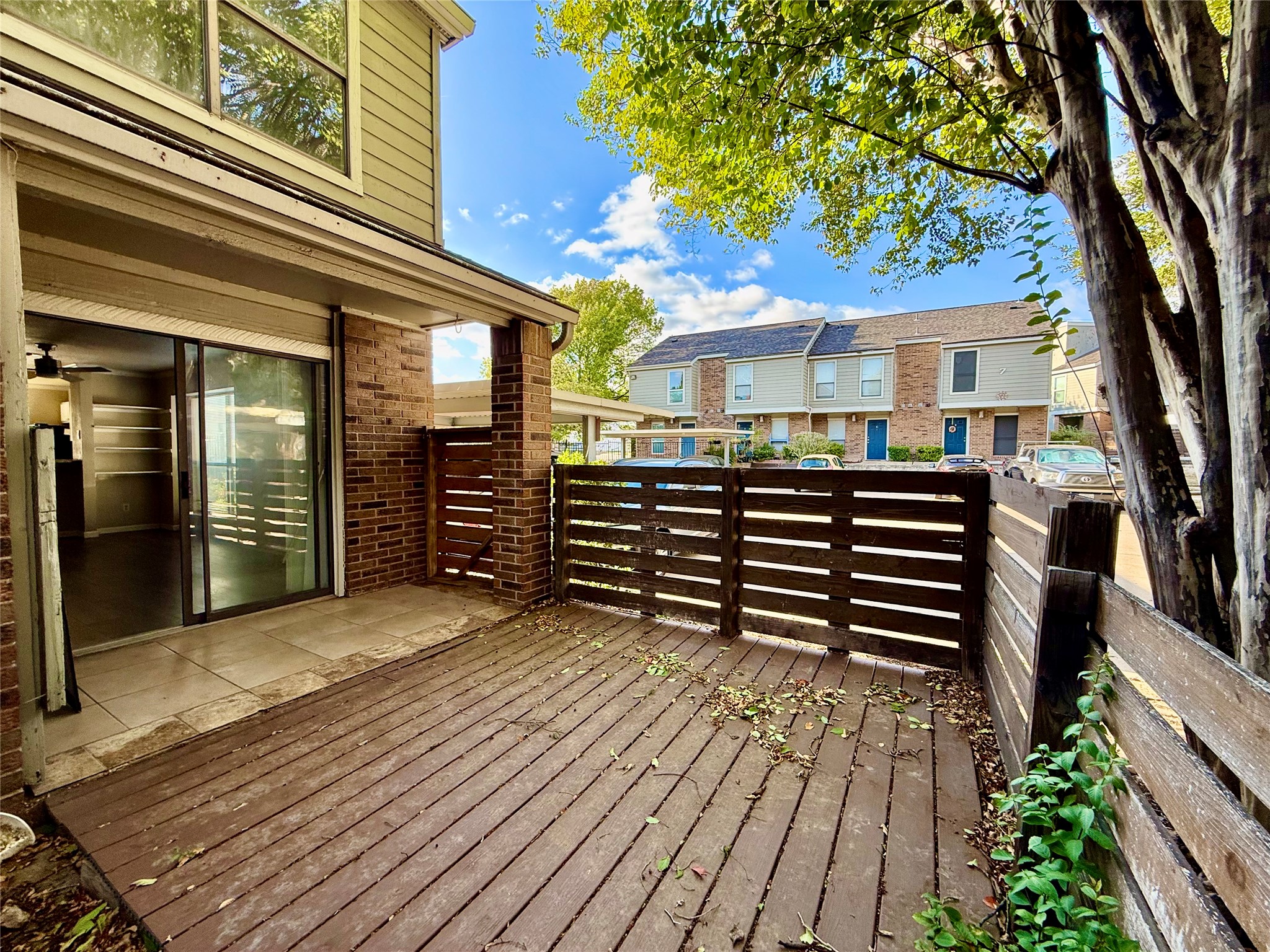 2018 West Rundberg Lane, Unit 6A Austin, TX 78758 - Photo 16 of 16 Wooden terrace and direct access to your cover parking space.