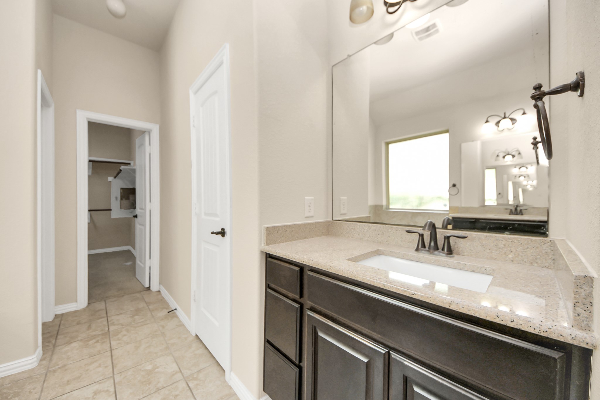 12131 Cove Ridge Lane Cypress, TX 77433 - Photo 30 of 46 a bathroom with a sink and a mirror