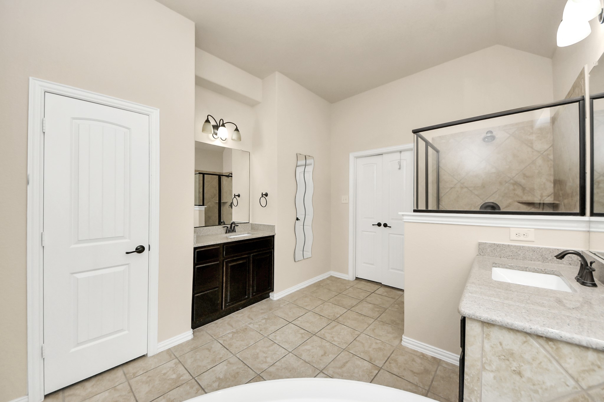 12131 Cove Ridge Lane Cypress, TX 77433 - Photo 31 of 46 a spacious bathroom with a sink and a mirror