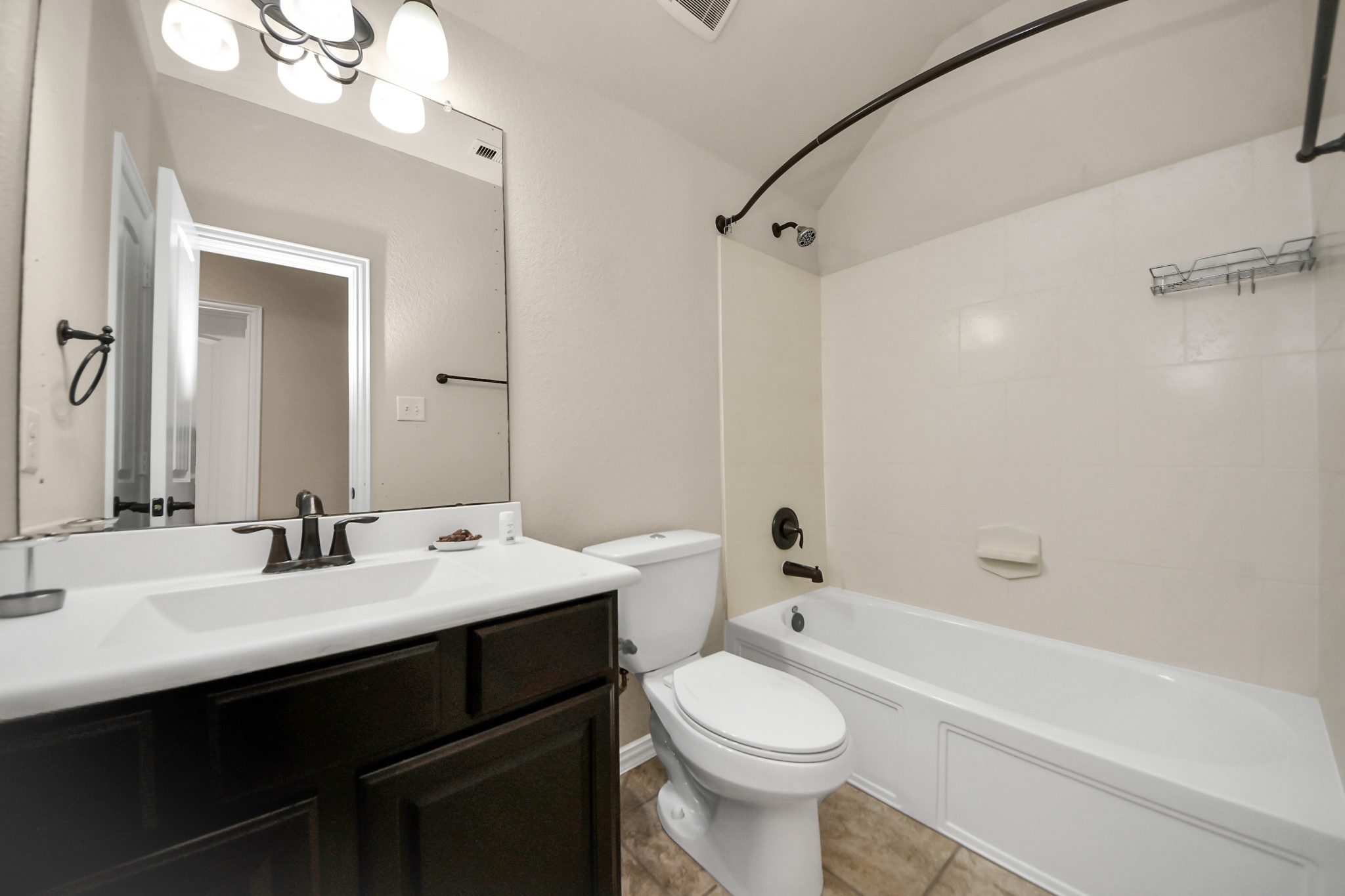 12131 Cove Ridge Lane Cypress, TX 77433 - Photo 39 of 46 a bathroom with a sink a toilet and shower