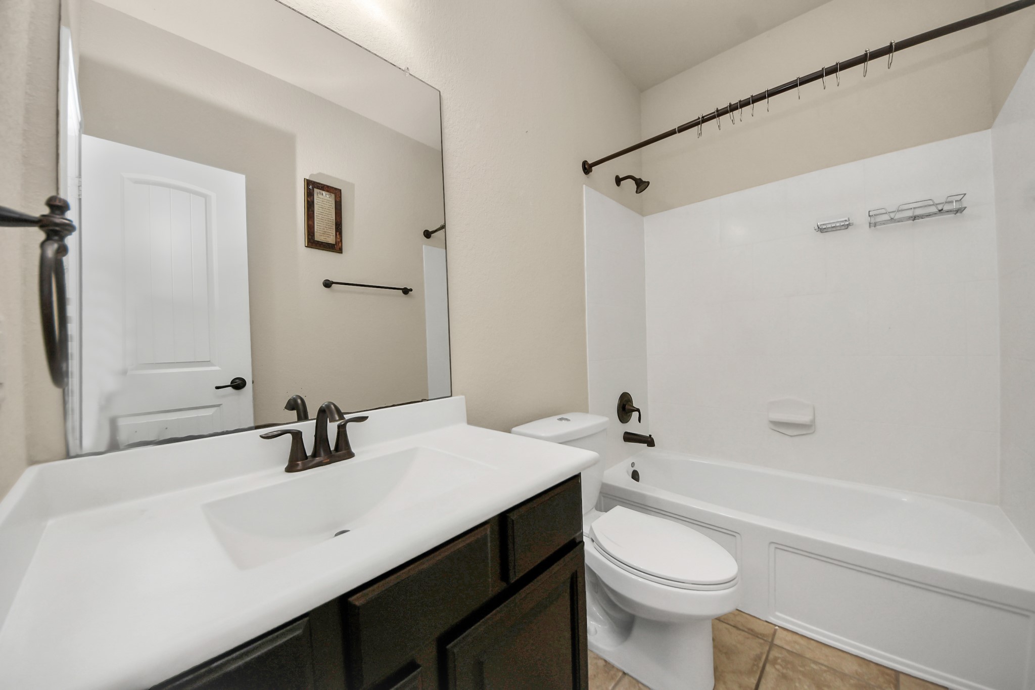 12131 Cove Ridge Lane Cypress, TX 77433 - Photo 8 of 46 a bathroom with a sink a toilet and shower