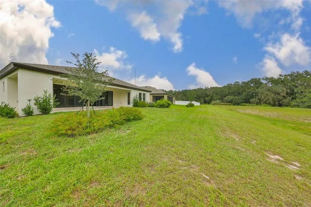 a house view with a garden space
