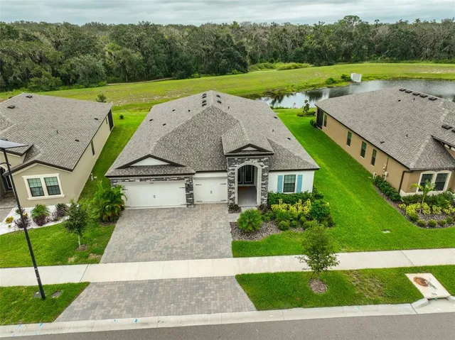 a aerial view of a house with garden