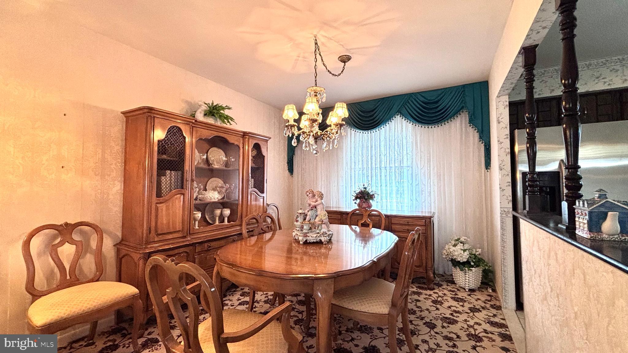 9401 Tulip Street Philadelphia, PA 19114 - Photo 13 of 67 a dining room with furniture and window