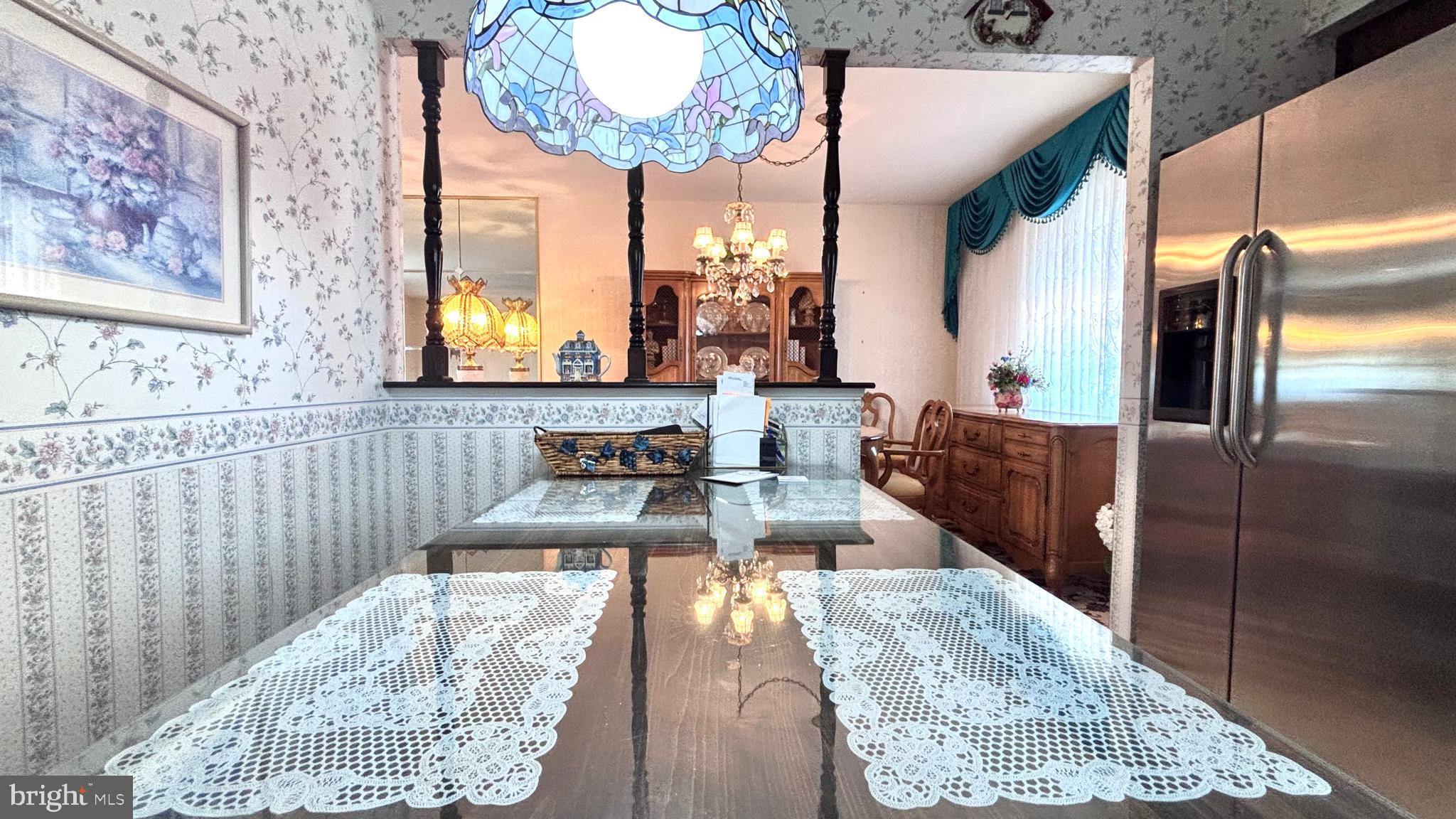 9401 Tulip Street Philadelphia, PA 19114 - Photo 22 of 67 a large kitchen with a table and chairs