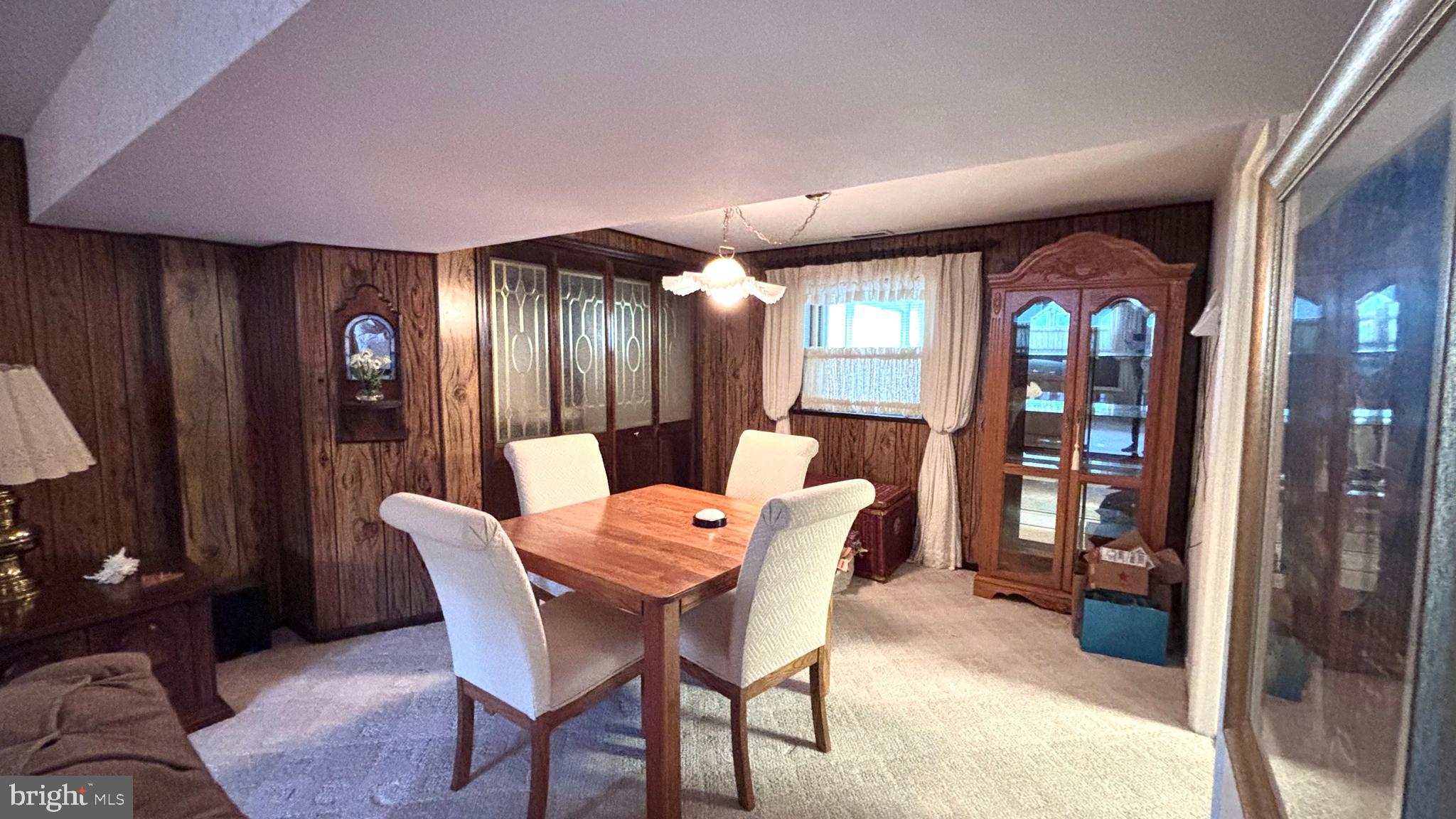 9401 Tulip Street Philadelphia, PA 19114 - Photo 32 of 67 a view of a dining room with furniture and wooden floor
