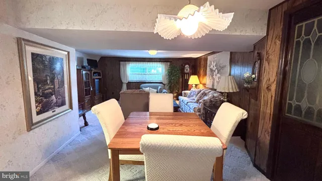 a bedroom with a bed and a table in it